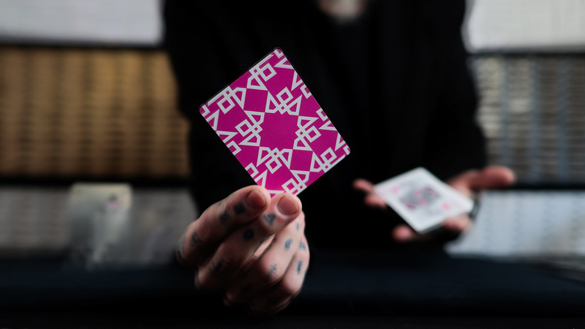 Daniel Madison holding Pink Masters Playing Cards