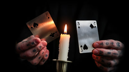 Daniel Madison holding the BURN tools - BURN by Daniel Madison and Eoin O'hare of the Perfect Shuffle template for playing card revelations BURN trick