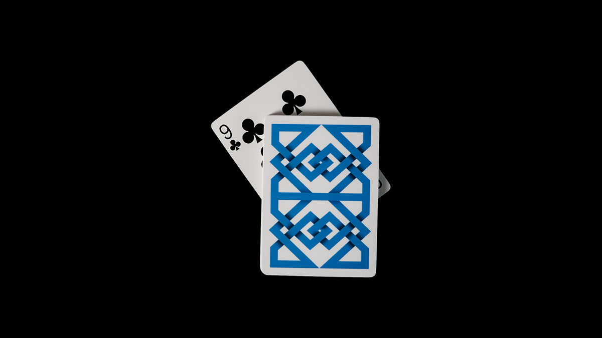 Daniel Madison - the 9 of Clubs and the Mad Deck blue Svengali playing cards 9 of Clubs protruding the deck