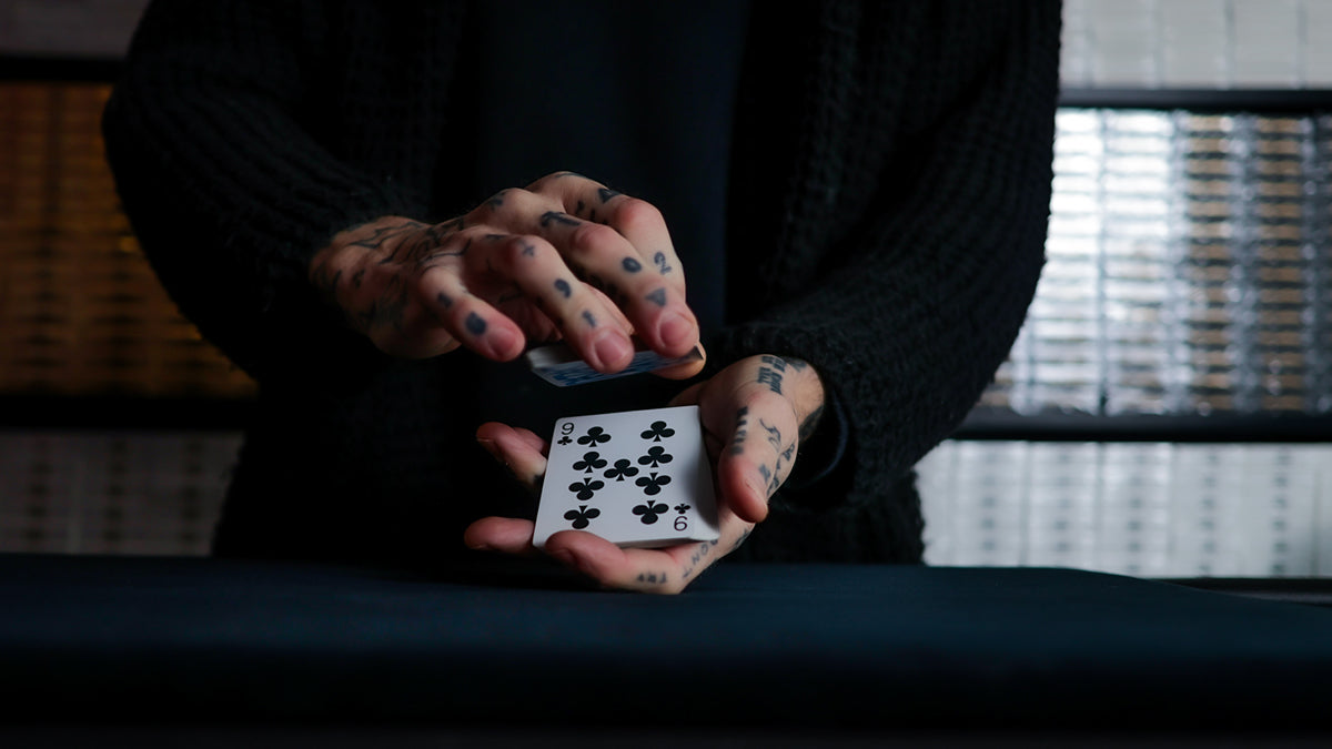 Daniel Madison - the 9 of Clubs and the Mad Deck blue Svengali playing cards dribbling the deck