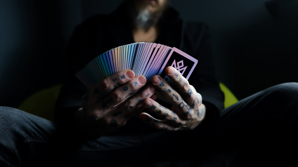 Acolyte holographic playing cards rainbow fan spread by Daniel Madison, smooth handling deck for cardists
