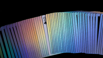 Wide spread of Acolyte holographic playing cards by Daniel Madison, premium deck for magic and cardistry with nine of clubs displayed