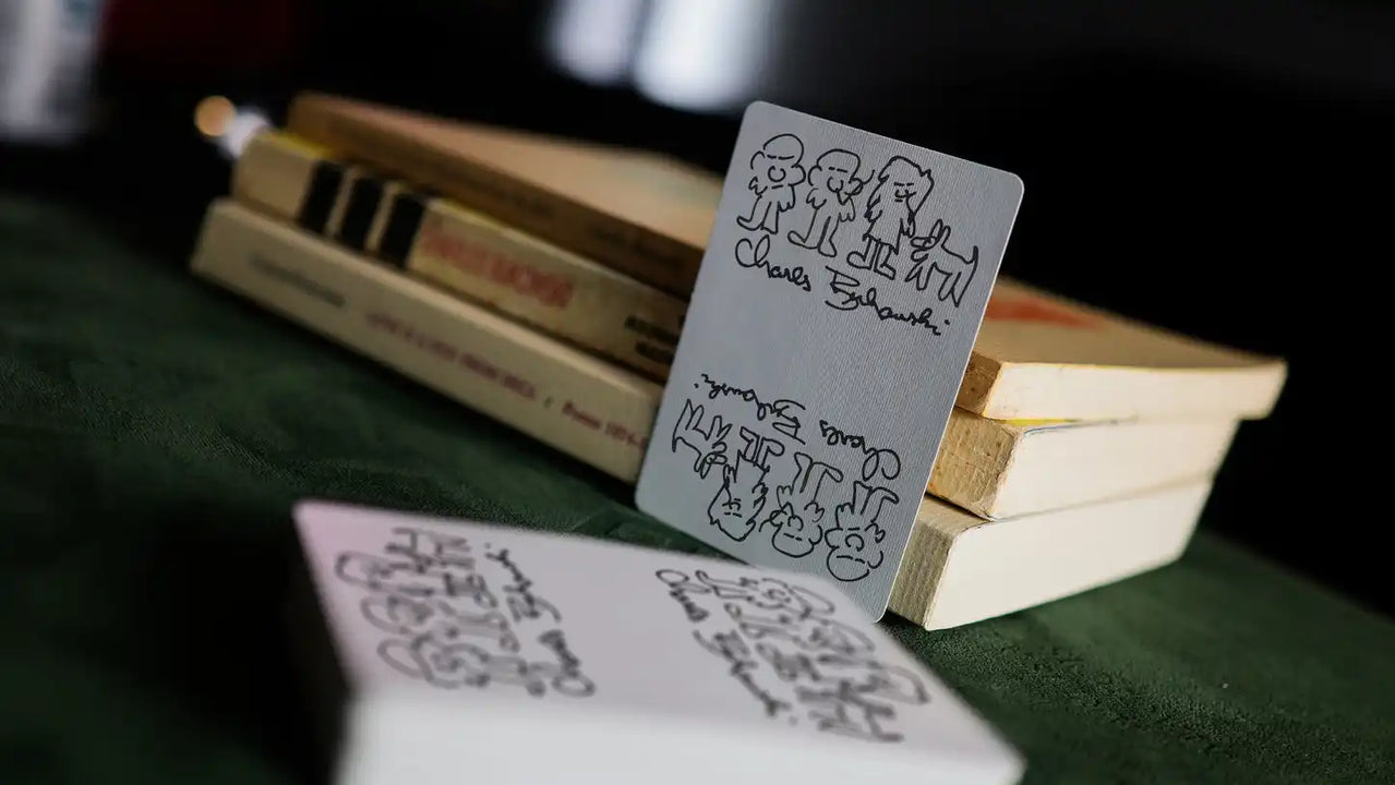 Ace of Spades from KING BUK Playing Cards featuring Bukowski's sparrow sketch looking down on Buk in birdcage, design also appears on back of tuck, limited edition