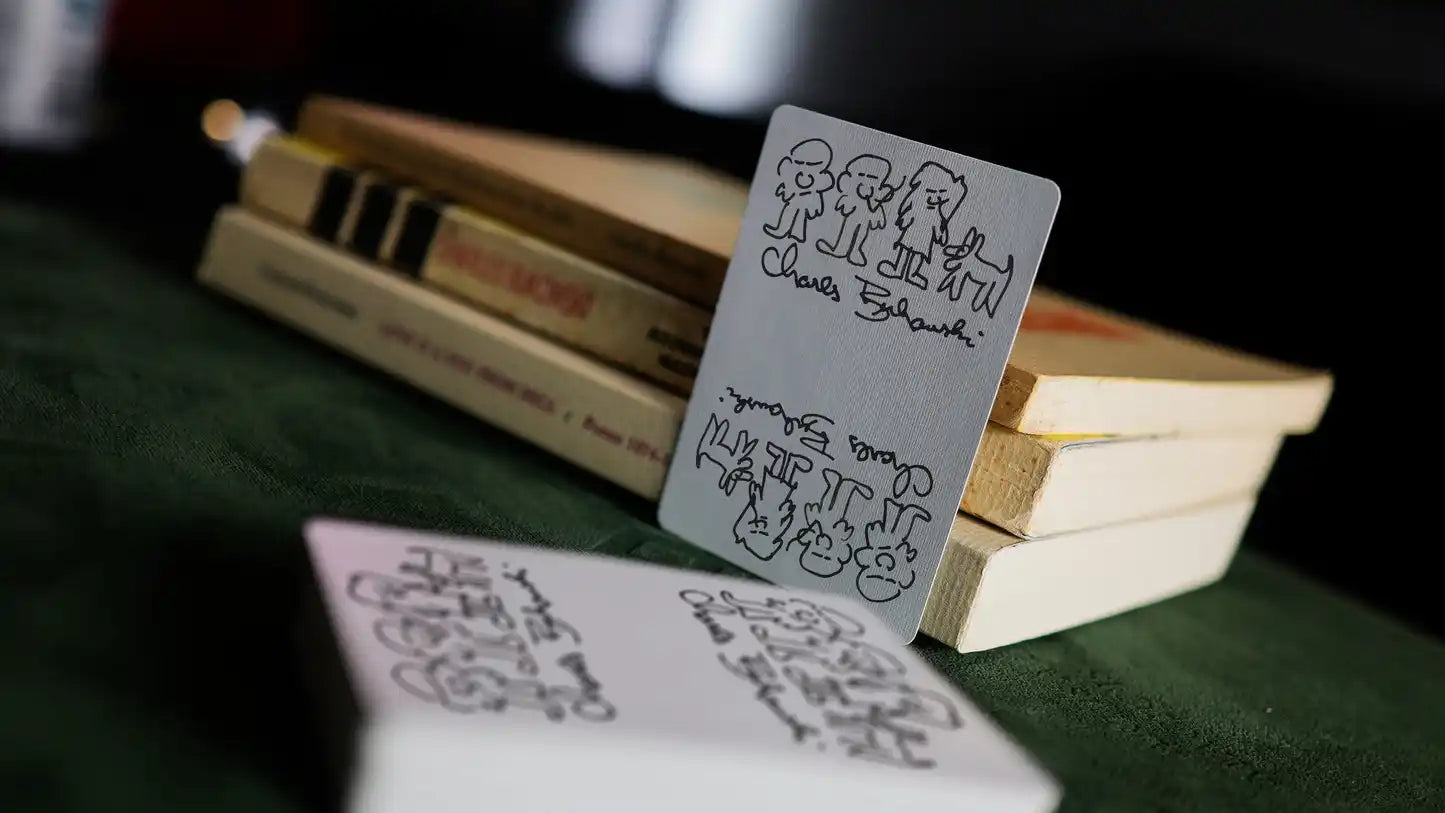 Ace of Spades from KING BUK Playing Cards featuring Bukowski's sparrow sketch looking down on Buk in birdcage, design also appears on back of tuck, limited edition