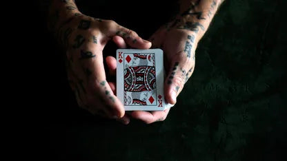 Custom KING of DIAMONDS by Haris Arya featuring Daniel Madison's hand tattoos and hidden 9 of Clubs revelation, a never before seen variation for the Artifice Playing Cards that never came to be