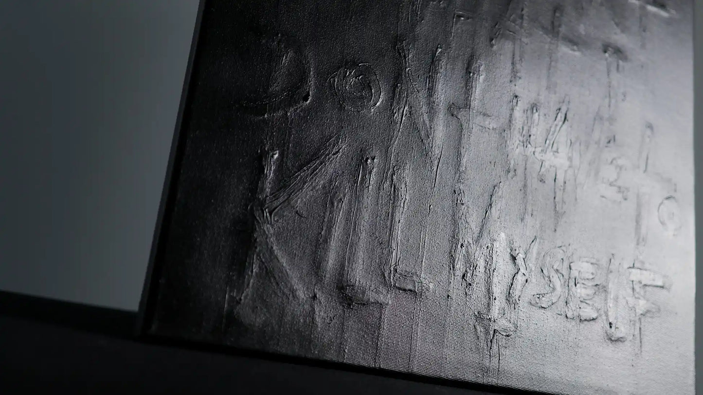 Second layer of SURVIVAL - Daniel Madison adding black paint to hide truth, but message remained raised from canvas, creating secret message hidden in open, filmed in 2025